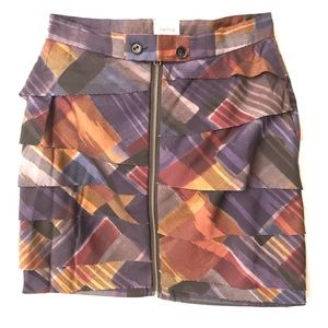 miniskirt with ruffles and front zipper